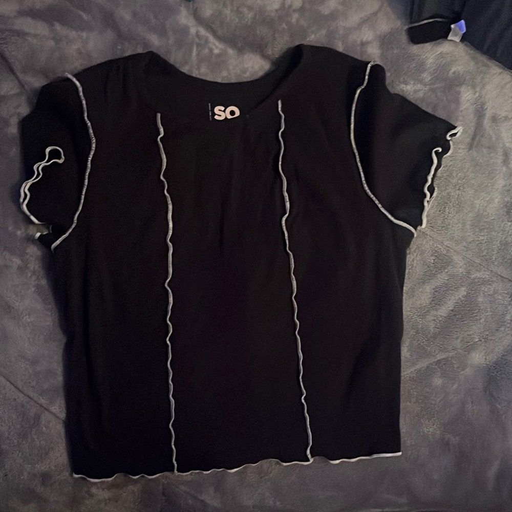 Black shirt with white stripes
